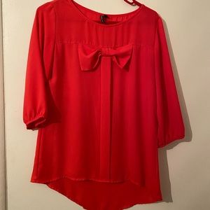 Orange bow blouse